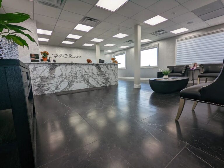 The modern and welcoming reception area at The Collins Center, where Dr. Beth Collins provides award-winning plastic surgery care.